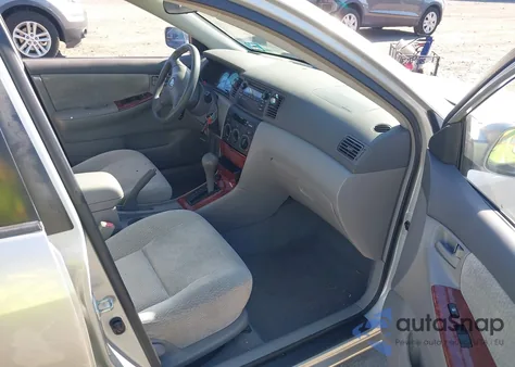 2003 Toyota Corolla Le z USA, uszkodzony, nr VIN 2T1BR32E33C033710